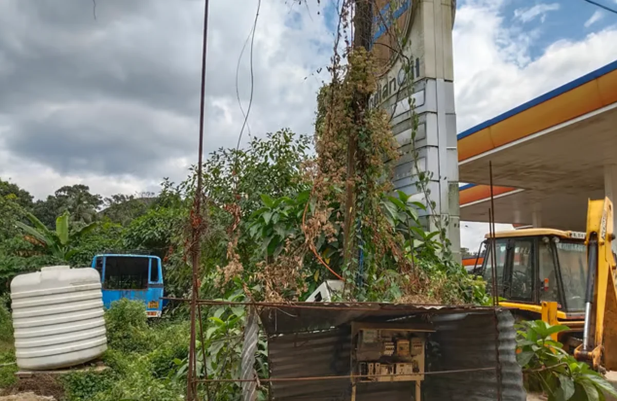 The abandoned bus behind the closed petrol bunk.