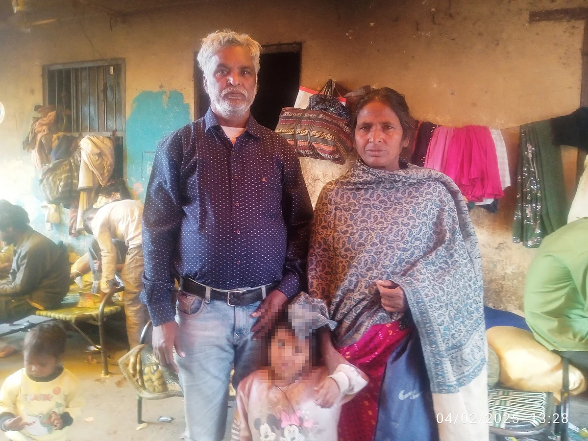 Neema with her grandparents.