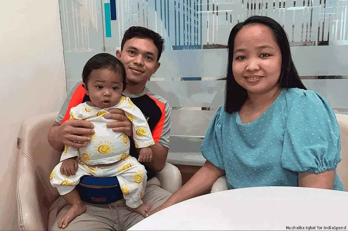 Amer Ali and Cassandra from the Philippines with their one-year-old son Zulqarnain Ali. The couple traveled to India in March for the child’s treatment.