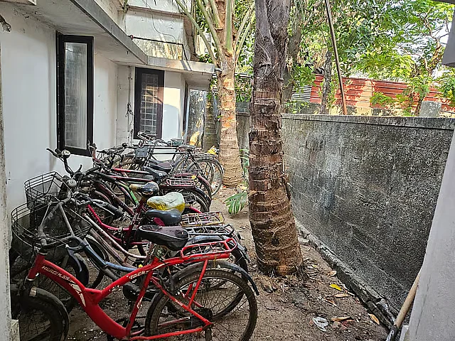 Cycles of the arrested migrants, in the backyard of the house where they lived in Munambam