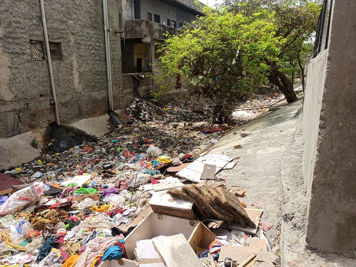 Garbage dumped in the Asola drain