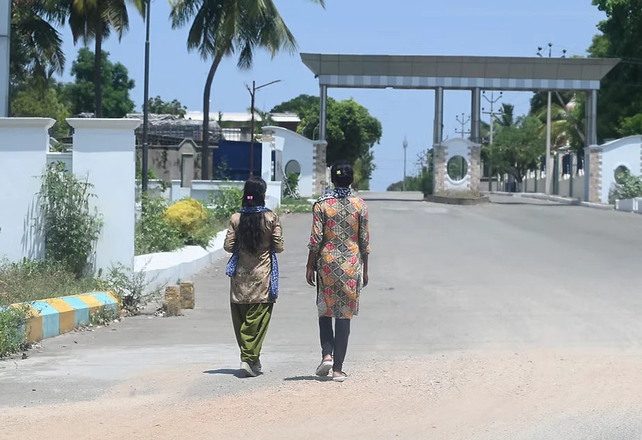 Workers heading to their factory at Vittalnayakan patti in Dindigul, Tamil Nadu.