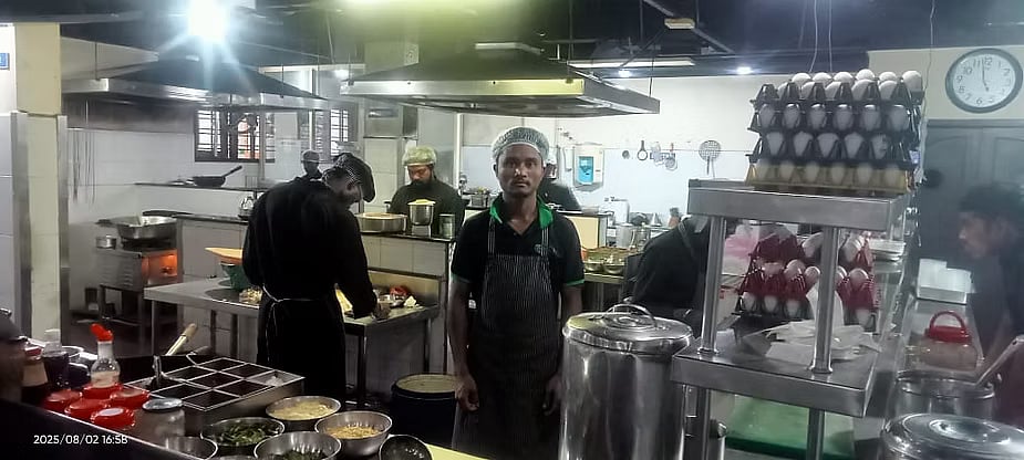 Lachchman Majhi works at a restaurant in Kerala as he slowly builds an entertainment business at home in Odisha. Photo: Lachchman Majhi