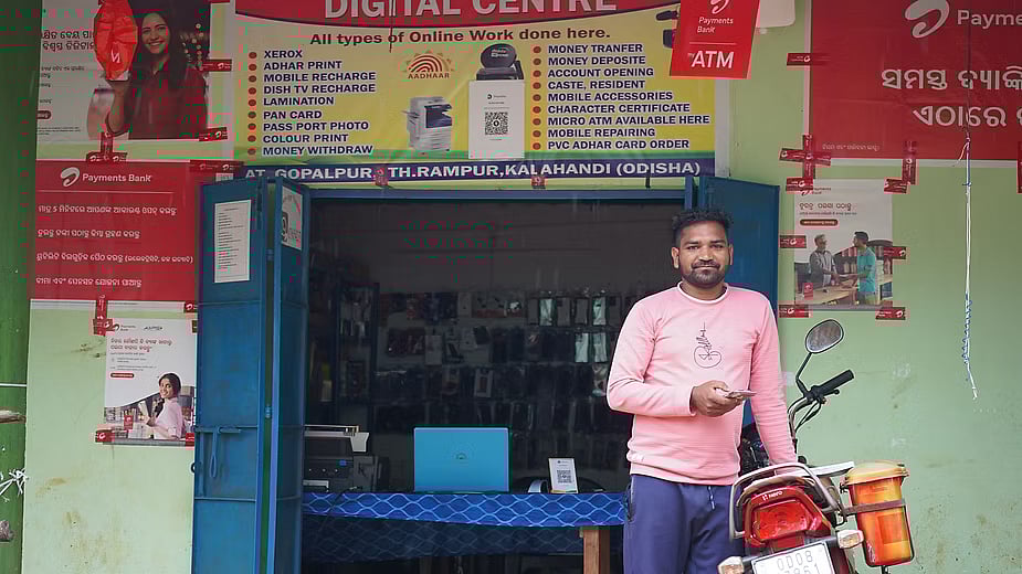 Rajan Naik runs a digital centre where locals can withdraw money with ease, as well as perform other essential services. Photo: Prajjwal Thakur