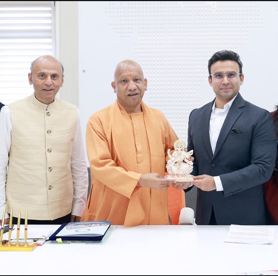 Sunil and Dhruv Galgotia at a meeting with UP Chief Minister Yogi Adityanath. (Image courtesy of the Galgotias University portal)