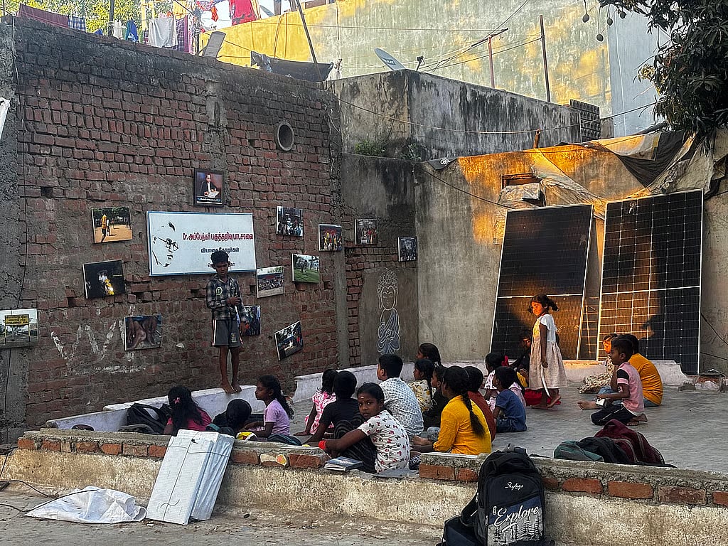Children attend a session conducted by Vyasai Thozhargal (Friends of Vyasarpadi), a citizen-led group working to create learning spaces in the neighbourhood.