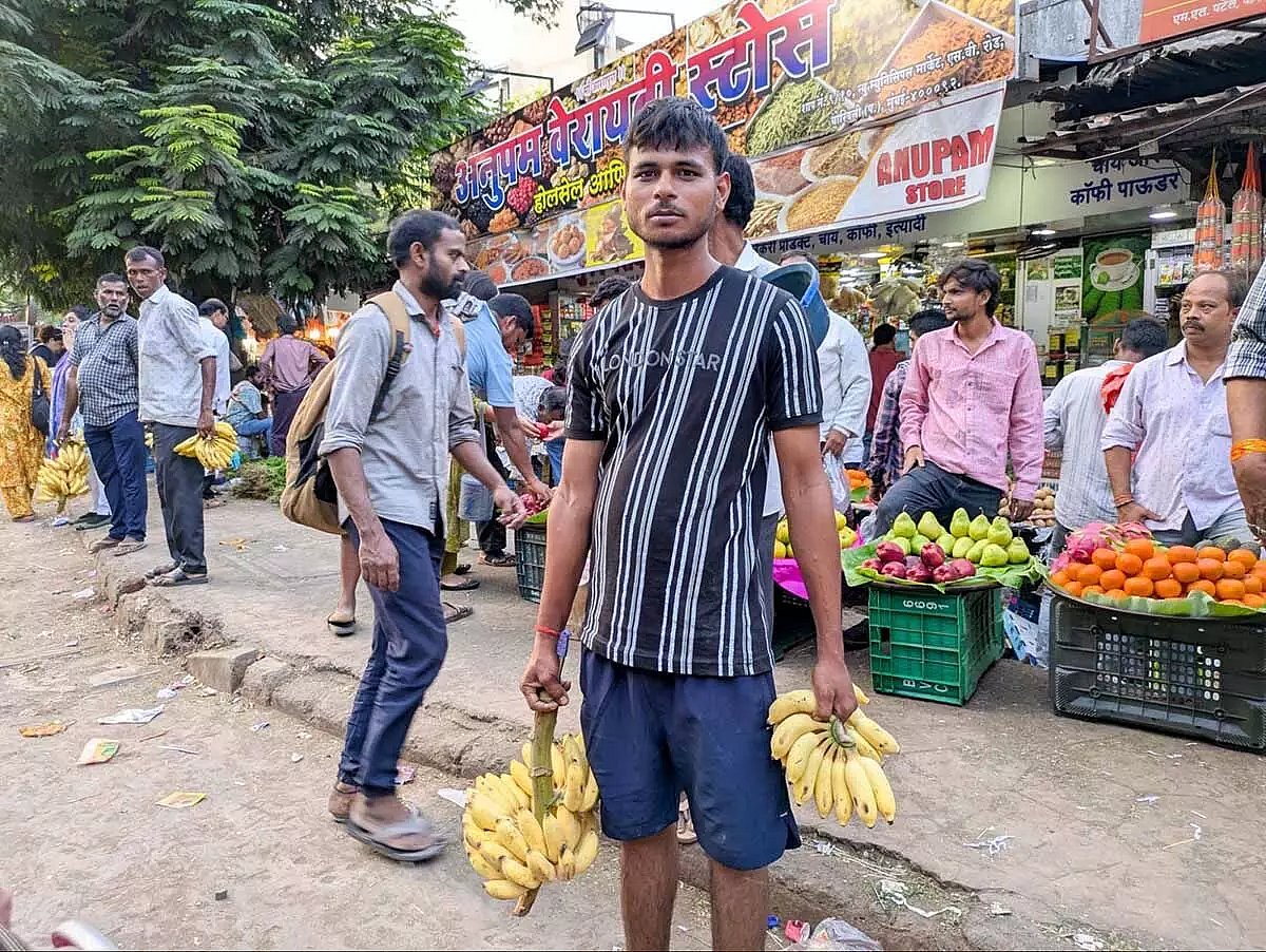 Anup Yadav is out to sell bananas for about 12 hours every day, but the summer heat affects his business.