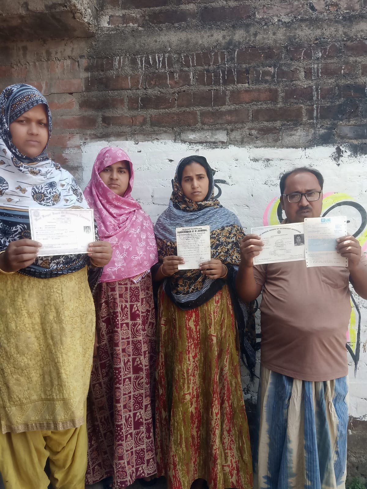 Md Anikul Hoque outside his home in Murshidabad's Samserganj. Eight of the nine voters in his family were removed from the electoral rolls. 