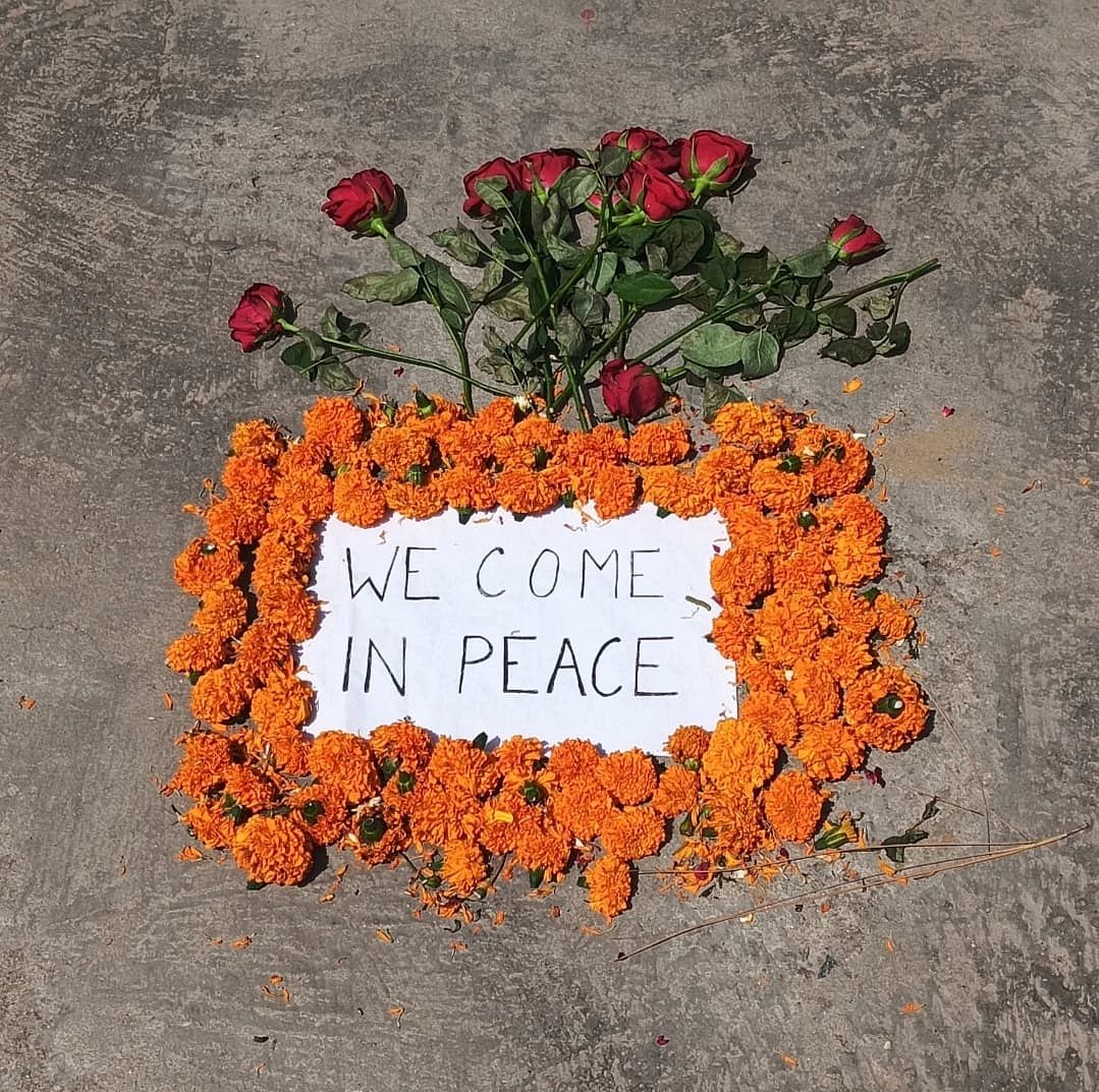 LSR students posted a sheet of paper outside their principal's office that read, "We Come in Peace."