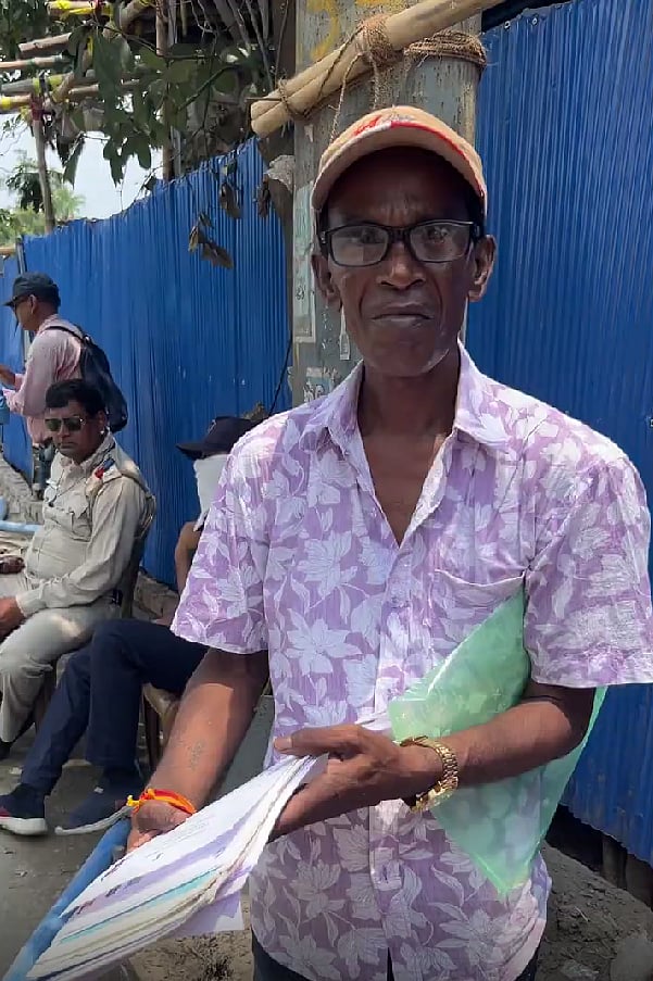 Dwijen Mitra, a tailor from Behala