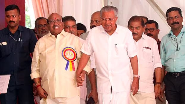 Chief Minister Pinarayi Vijayan with SNDP Yogam general secretary Vellappally Natesan at a public event.