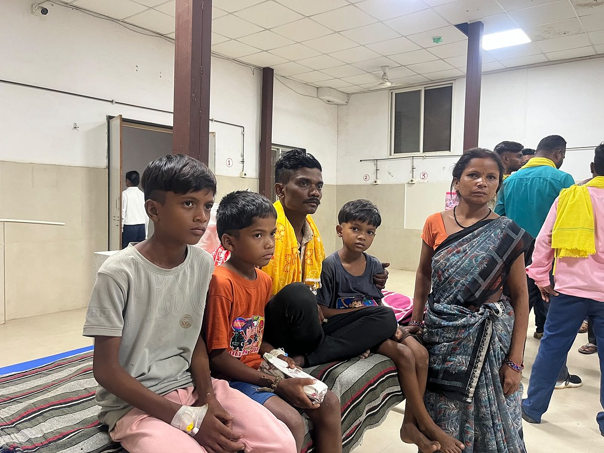 Lavkush’s family with their three sick children on the same bed