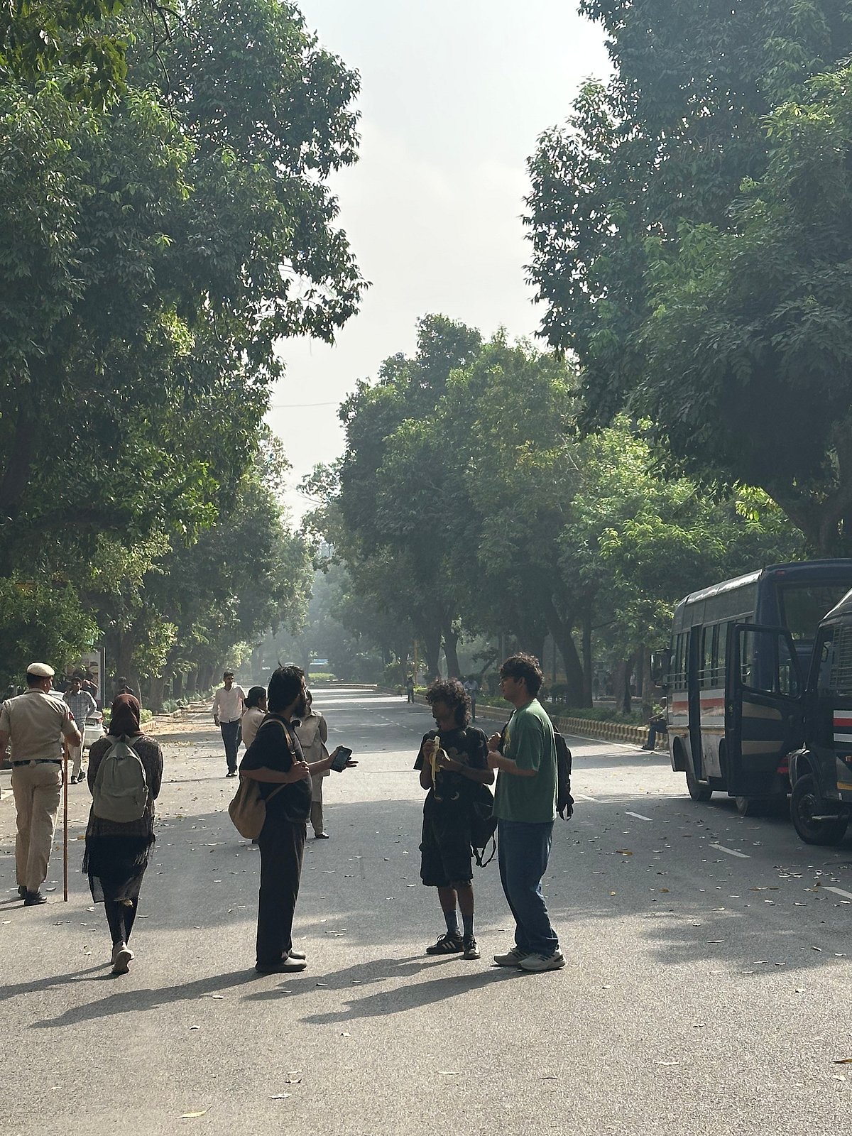 Early in the morning, protestors wait for others to join them
