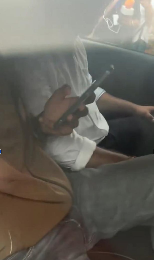 Seen in the car that fled away.