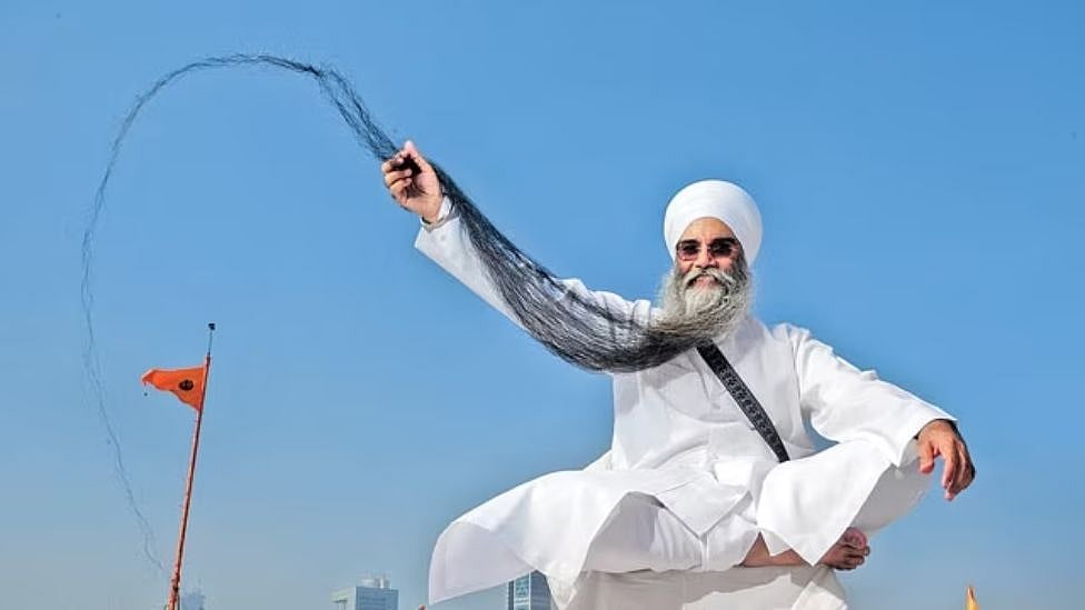 8 அடி, 3 அங்குலம் : நீளமான தாடி வளர்த்து கின்னஸ் சாதனை படைத்த நபர் - எங்கே?