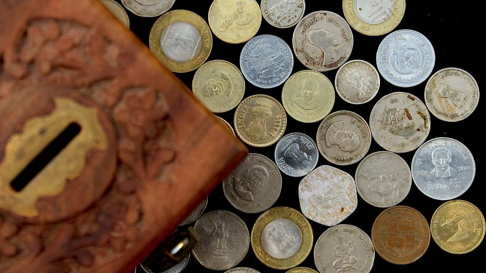 இந்திய ரூபாய் நாணயங்களில் இருக்கும் குறியீடுக்கு காரணம் என்ன? | Explained