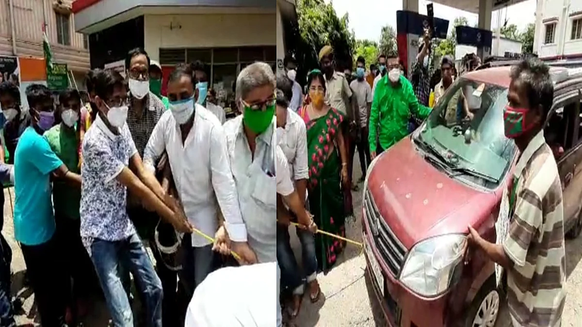 পেট্রোপণ্যের মূল্যবৃদ্ধির প্রতিবাদে দড়ি দিয়ে গাড়ি টানলেন বিধায়ক কাঞ্চন মল্লিক