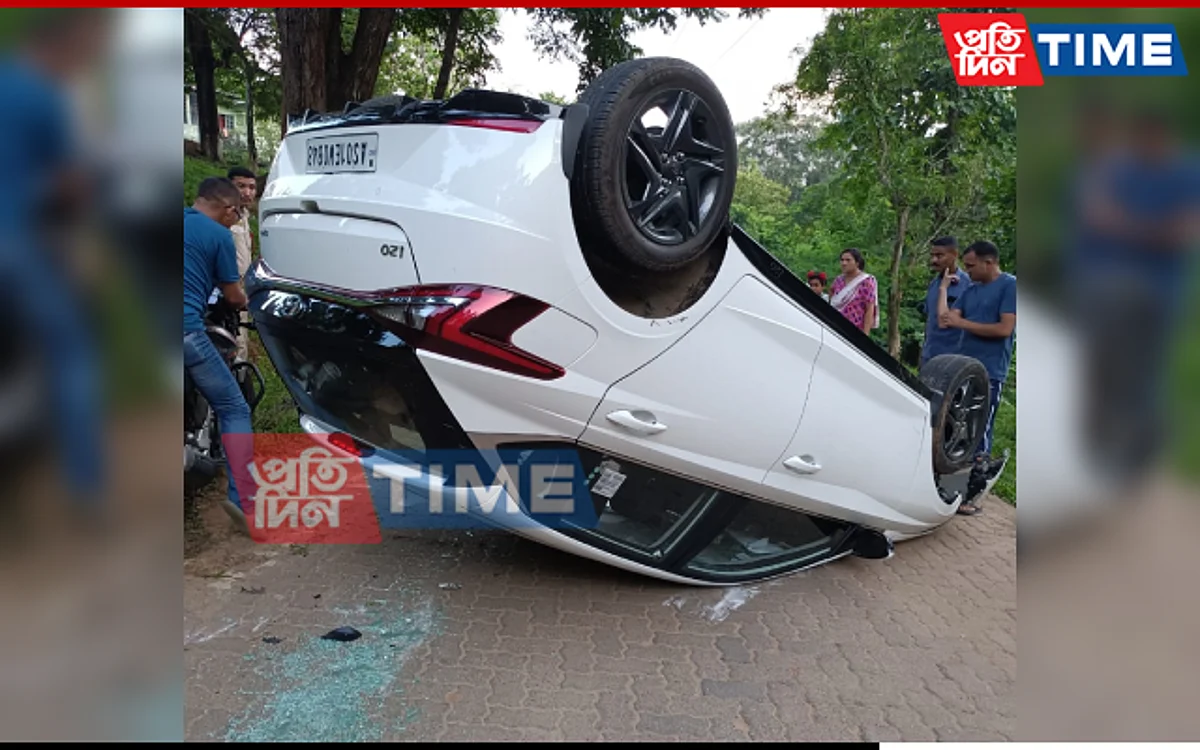 The car rammed into the gate and turned upside down in Guwahati's Kahilipara