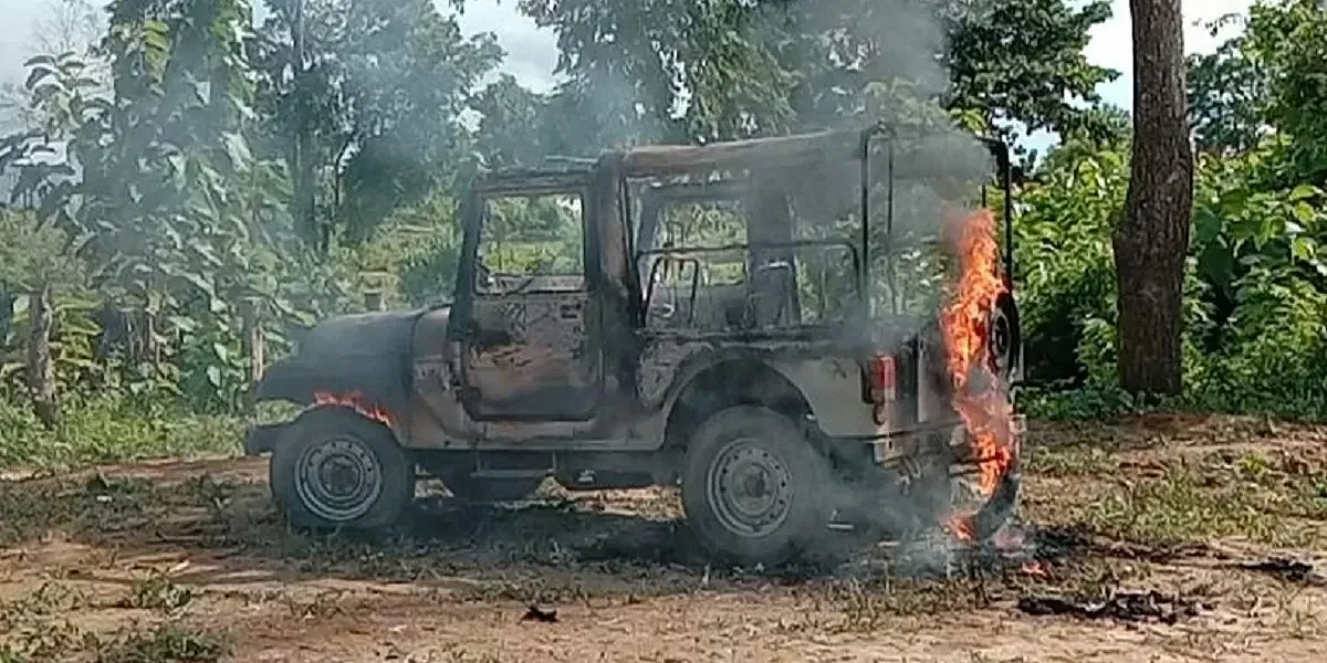 The police vehicle was set on fire as tensions flared in Tripura's Killa