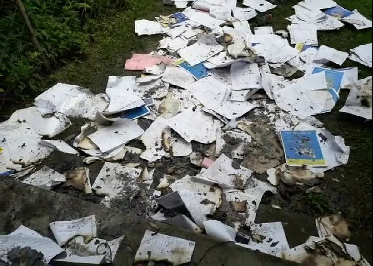 Debris of the documents burnt in the fire in Chariali Adarsha Vidyapeeth