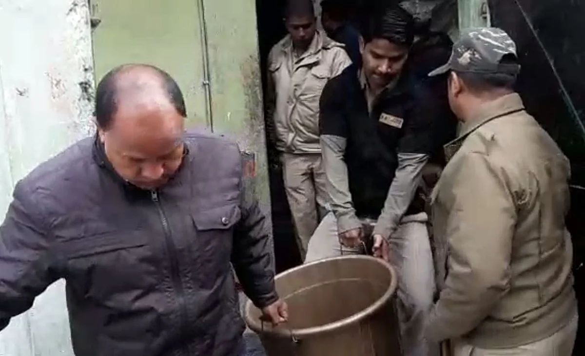 Illegal Liquor Dens Busted in Ulubari, 16 Arrested