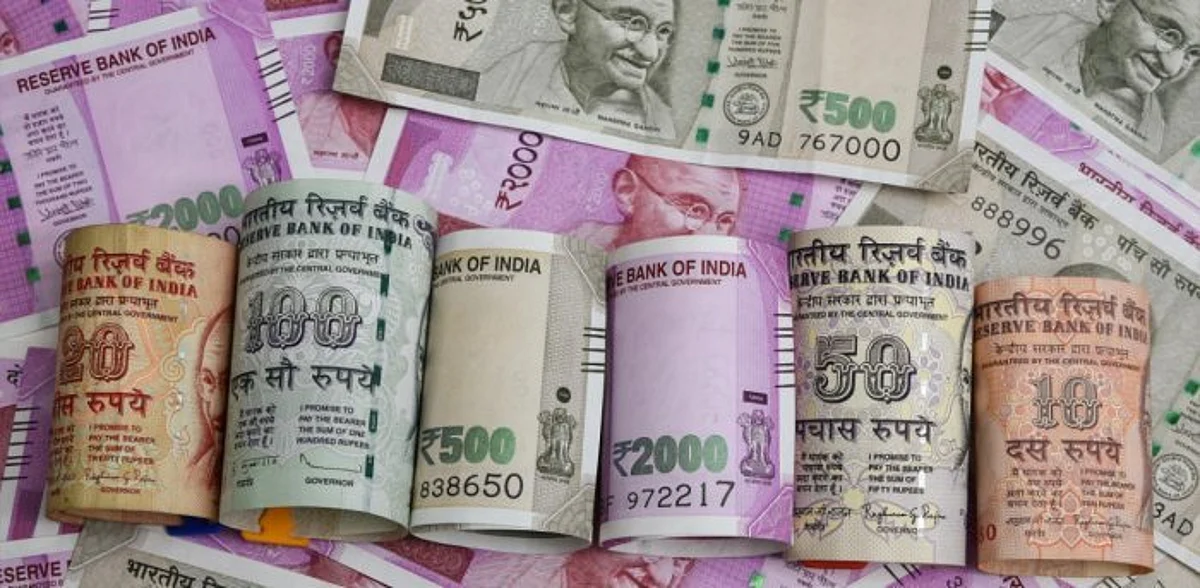 Indian Currency Falls By 5 Paise To Close At 74.24 Against US Dollar