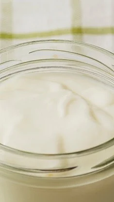 overhead view yogurt open glass jar napkin 23 2147872600 1