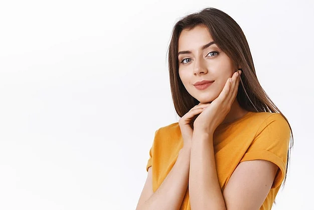 sensual attractive sassy brunette woman yellow tshirt gently touching clear skin smiling gazing camera coquettish express sexy charming attitude standing alluring white background176420 51006