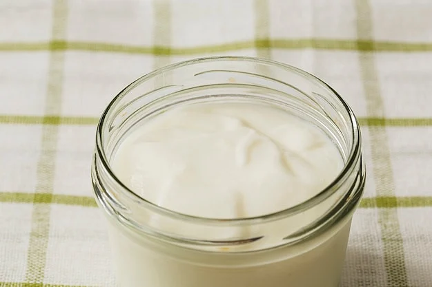 overhead view yogurt open glass jar napkin 23 2147872600 1