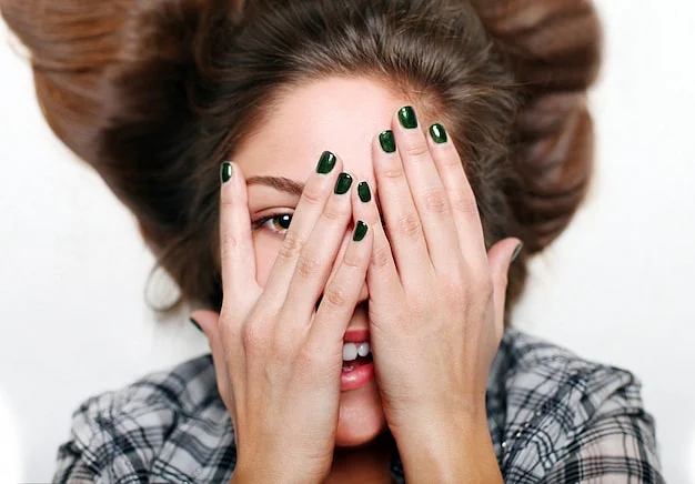 smiling teen hands face green nail art 144627 4336
