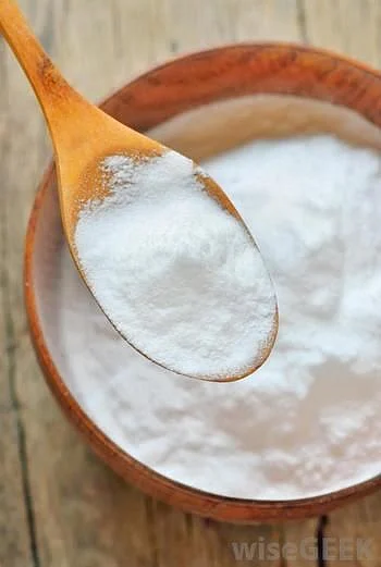 15 Ways To Use Baking Soda In The Garden Wrapped in Rust