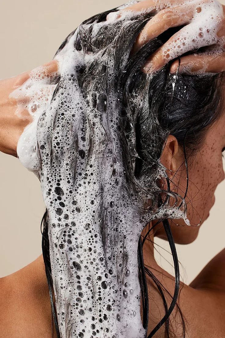 woman washing her hair