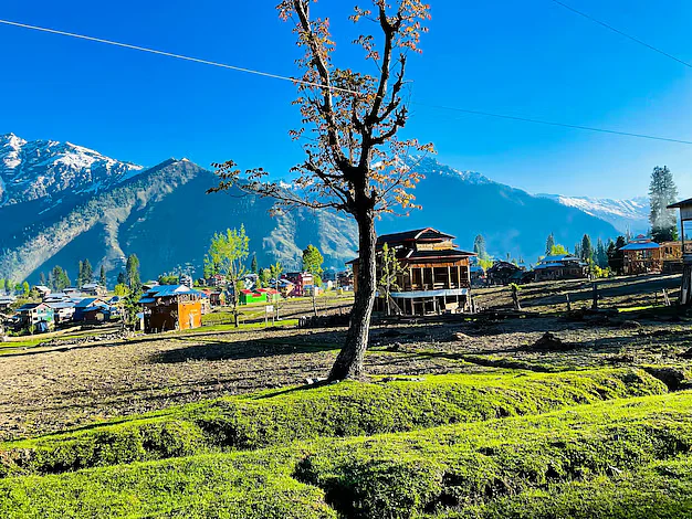 beautiful landscape arang kel kashmir with green fields local houses with hidden clouds505751 5863