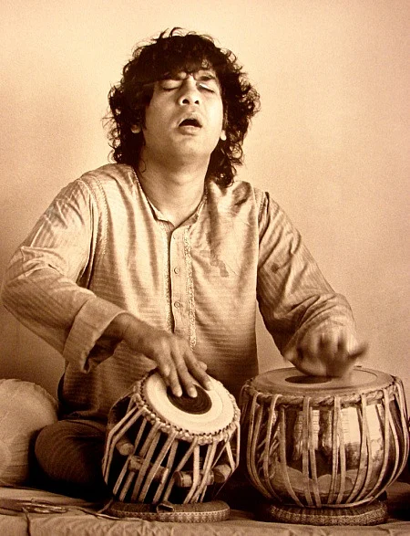 Ustad Zakir Hussain lost in the rhythms of his…