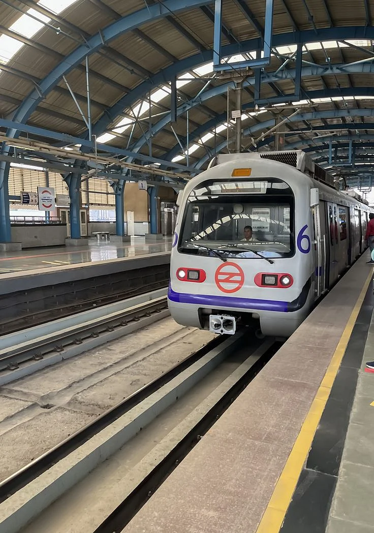 Delhi Metro train arriving at Metro station