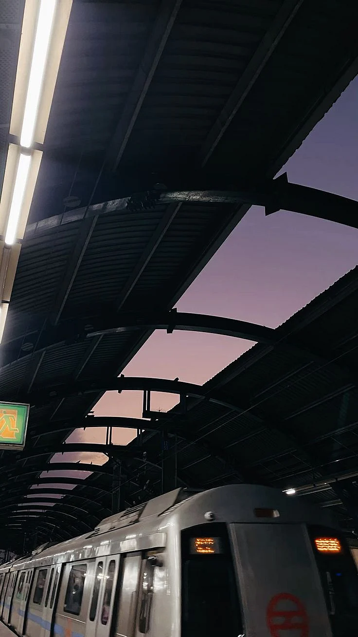 Purple sunset view A dreamy evening purple sky pov from delhi metro