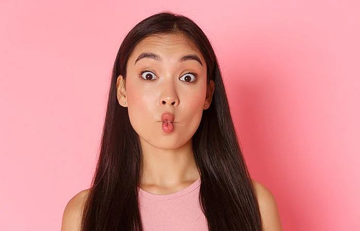12 Yoga Exercises For Slimming Your Face