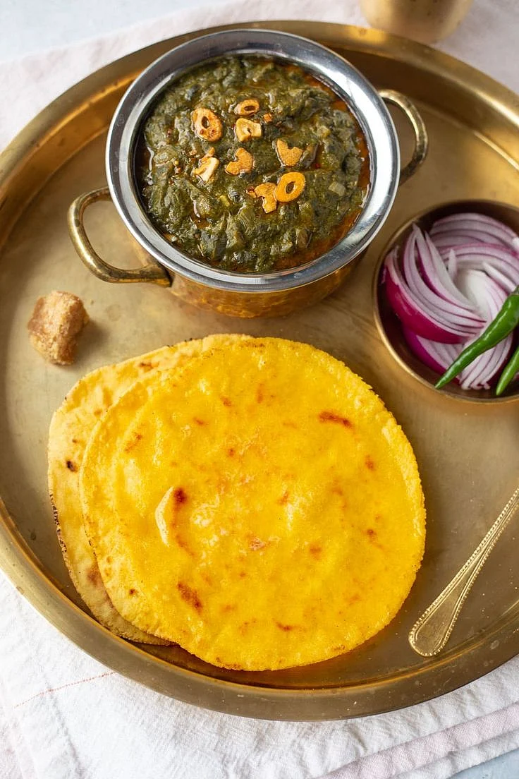 Corn roti and mustard greens
