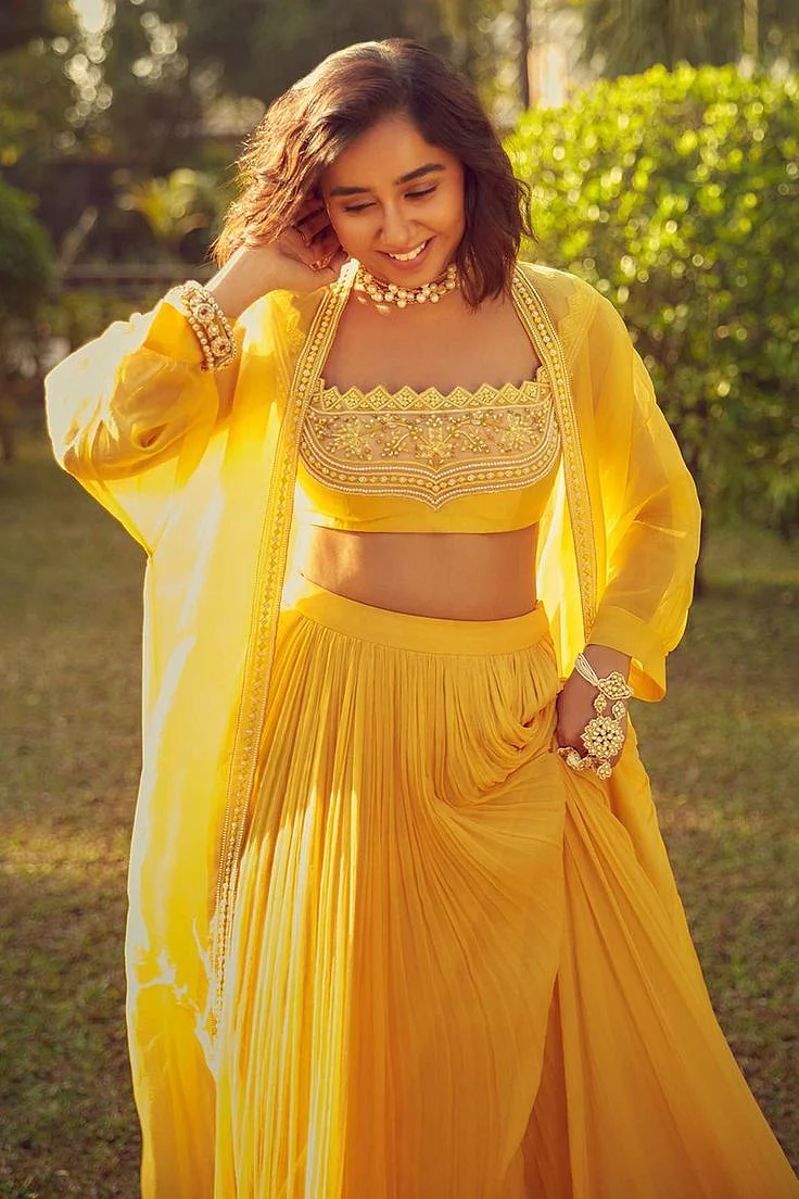 Buy Yellow Blouse Net Embroidered Floral Cape Open Organza And Chiffon Lehenga Set For Women by Ridhi Mehra Online at Aza Fashions