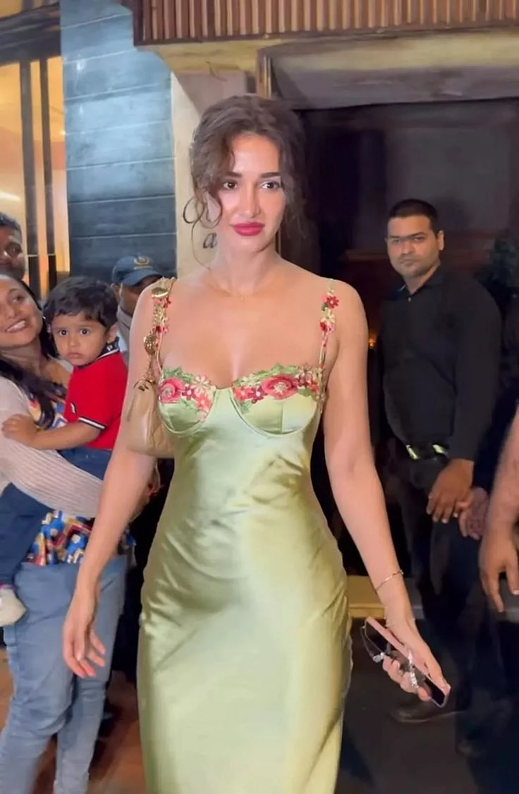 Disha Patani Raises The Temperature In An Extremely Affordable Green Maxi Dress With Floral Neckline