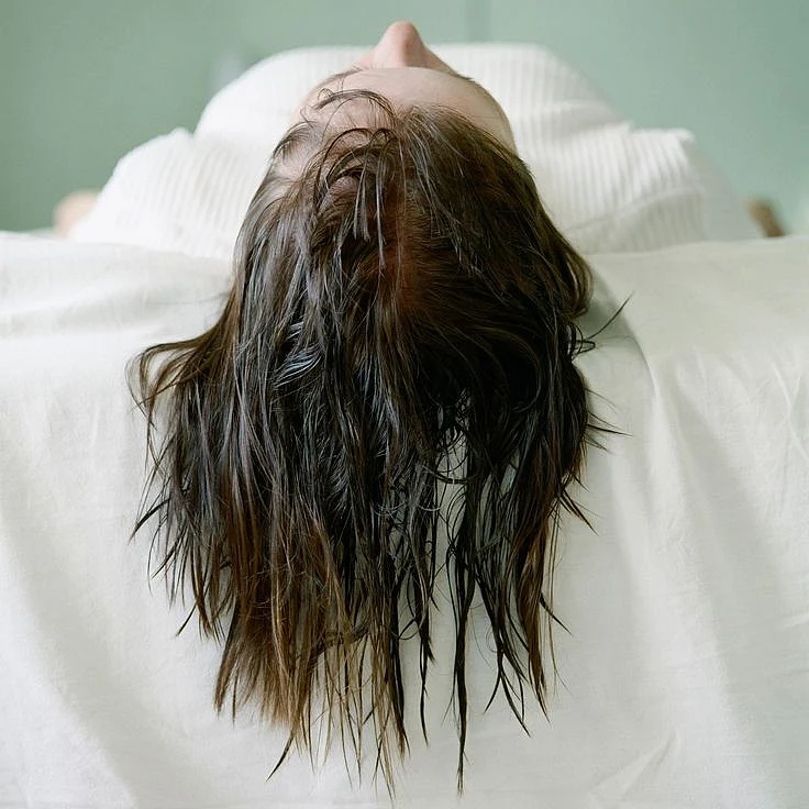 Is it bad to sleep with wet hair