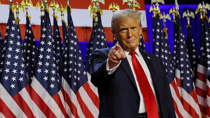 donald trump poses while addressing supporters at his rally in florida after election win photo r 07