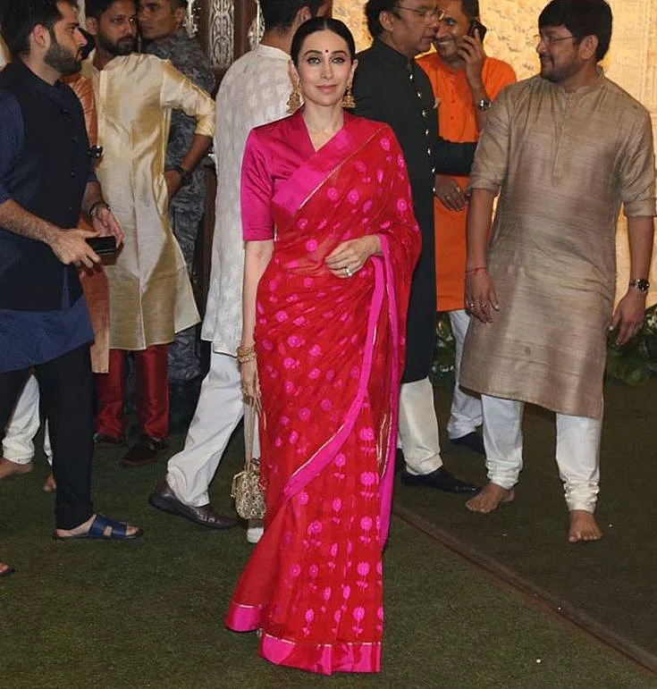 Karisma Kapoor loves wearing saris and we love seeing her in them