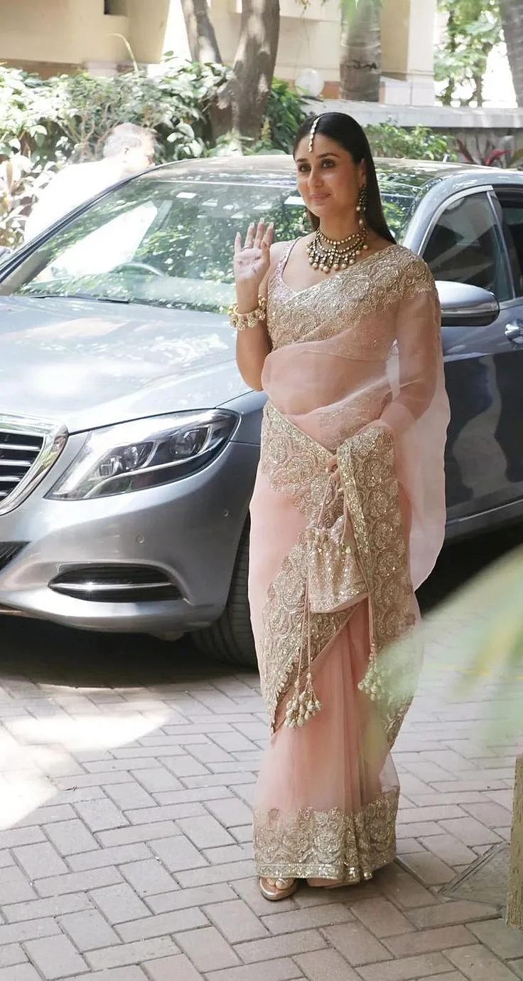 Kareena Kapoor looks magnificent in a pink Organza saree for Ranbir Kapoors wedding