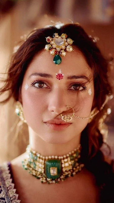 Tamannaah Bhatia Exudes Radharani Elegance in Rich Violet Lehenga