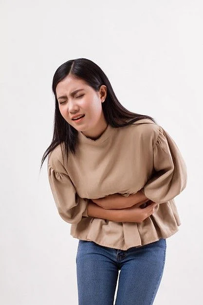 Premium Photo Woman with stomach ache menstrual period cramp abdominal pain food poisoning