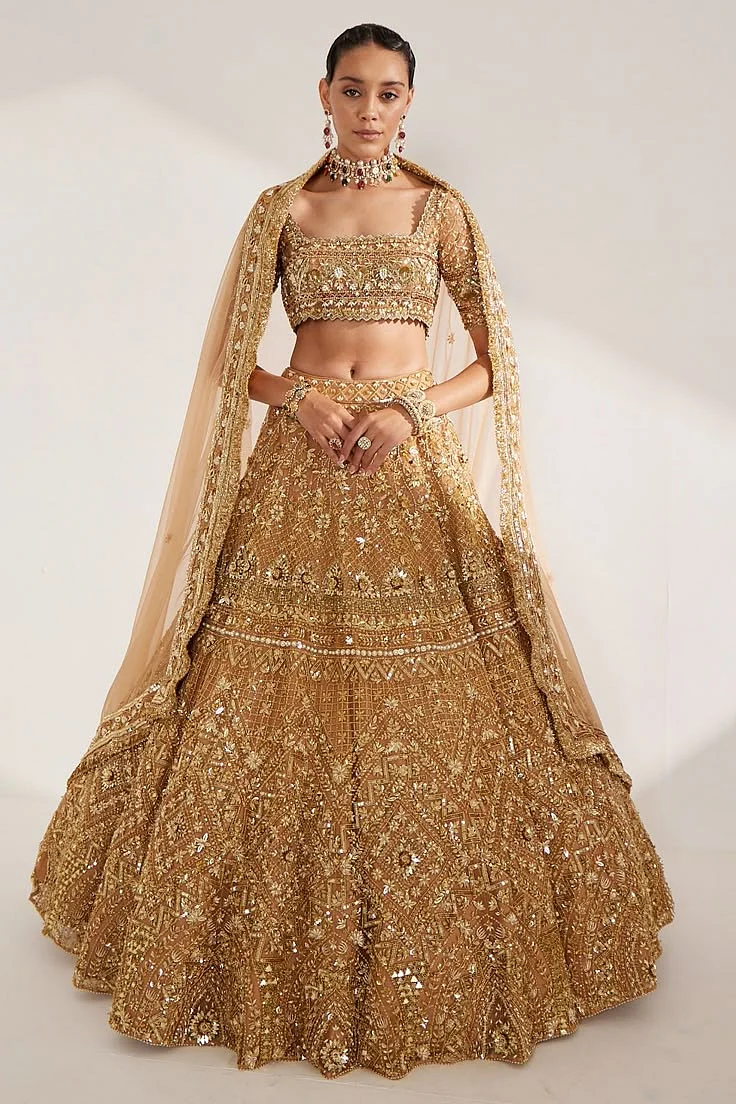 Gold Net Crystal Embroidered Bridal Lehenga Set by Ruchika Hurria at Pernia s Pop Up Shop 2025