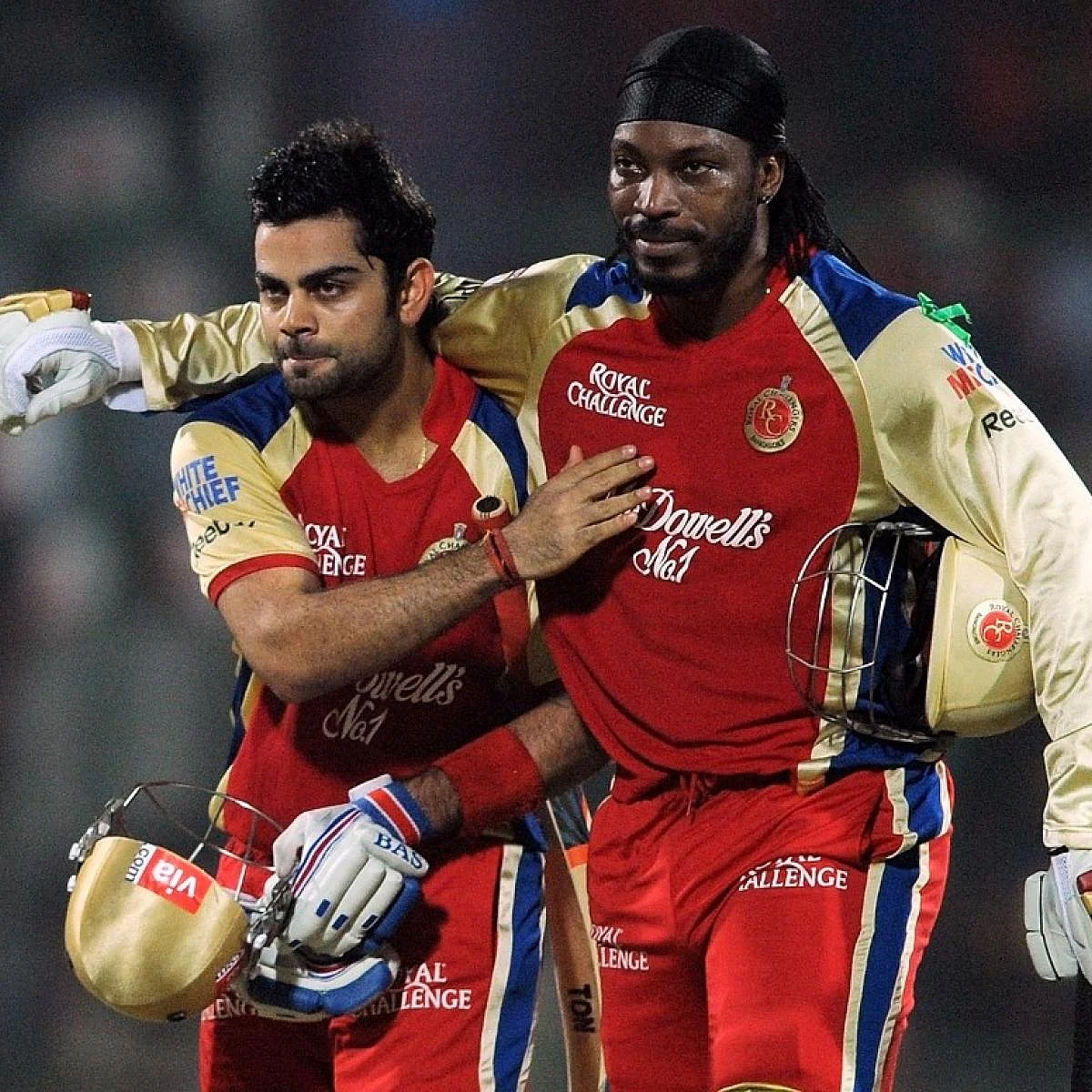 Virat Kohli with Chris Gayle 5