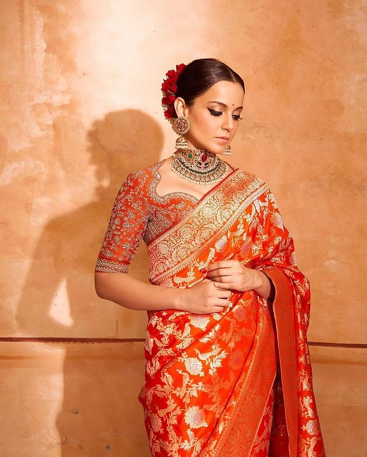 Kangana Ranaut looks absolutely ravishing in this red saree