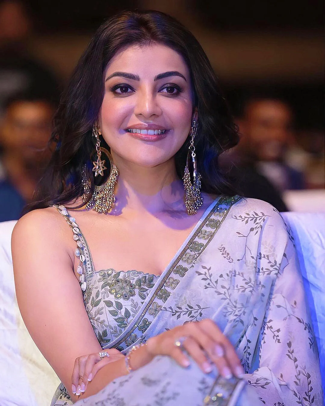 Kajal Aggarwal in Arpita Mehta pearl olive green classic sari and blouse set with cowrie shell detai